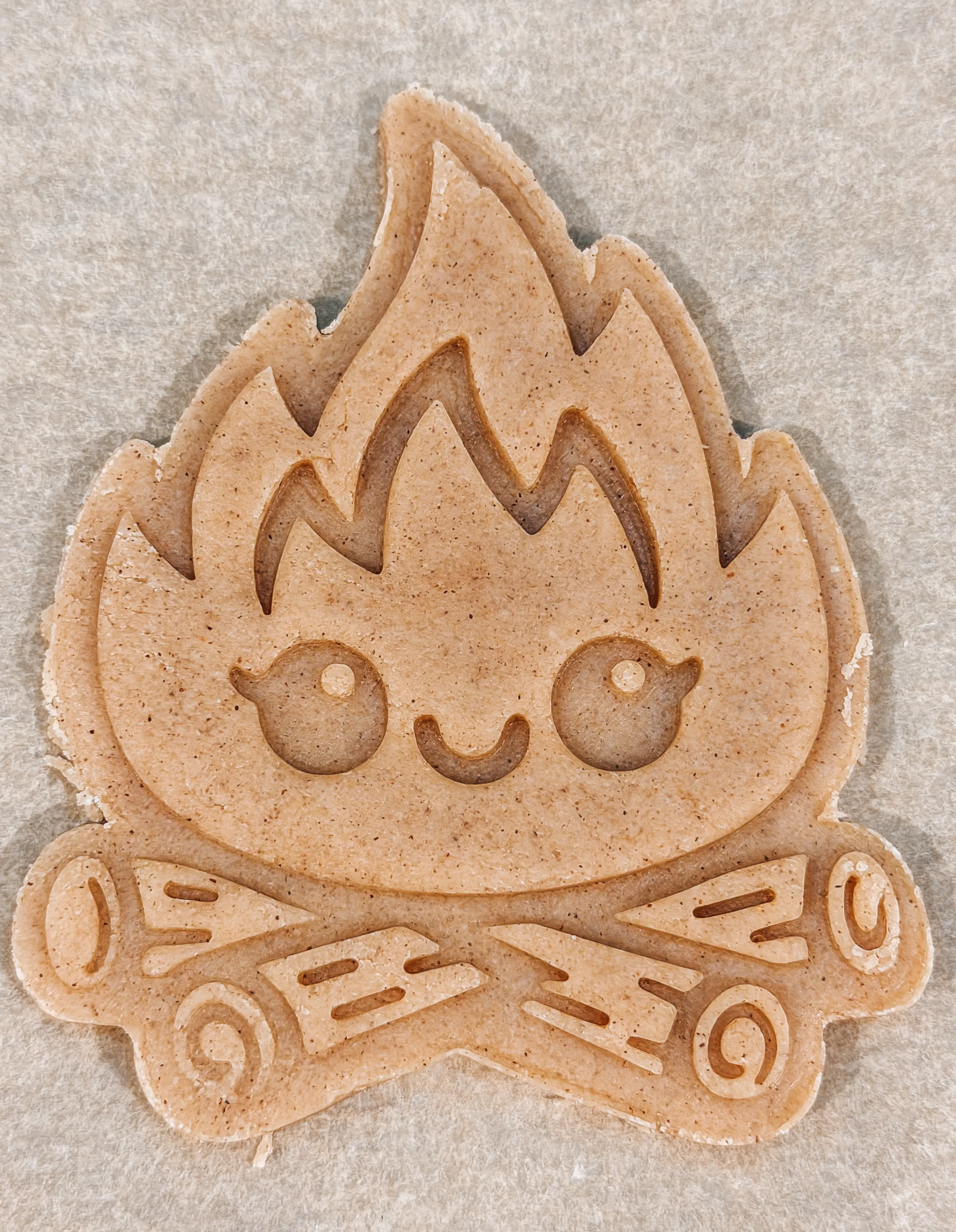 Image of a custom printed cookie stamp shape pressed into dough for a Wild One first birthday party