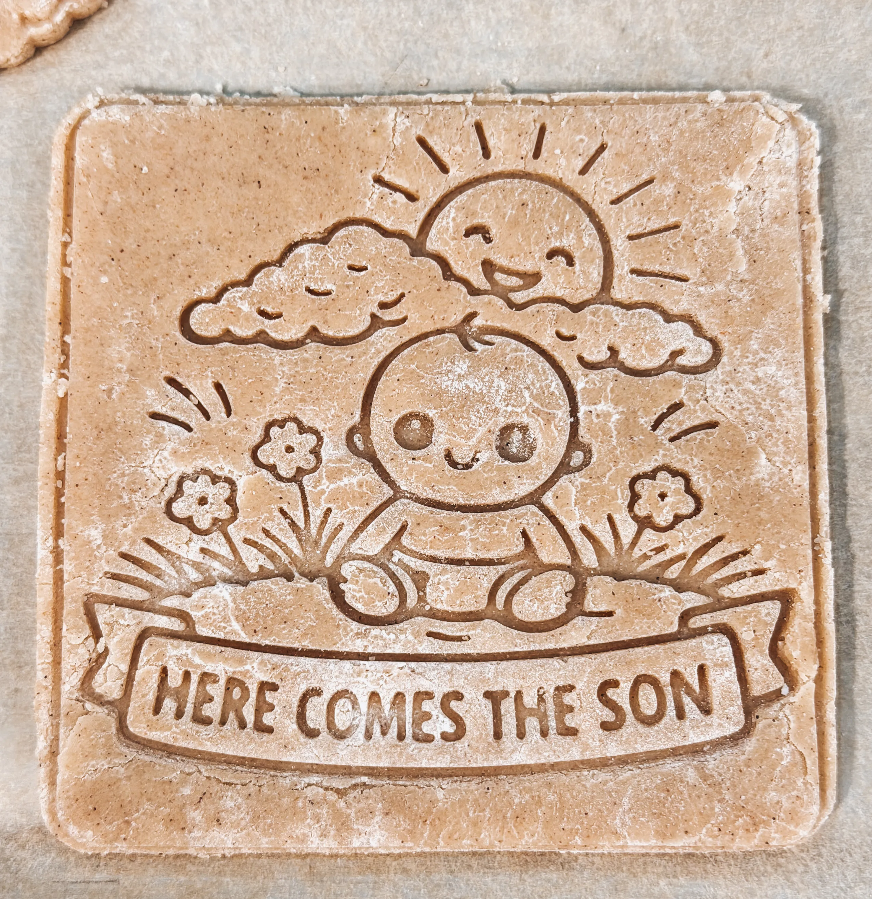 Image of a custom printed cookie stamp shape pressed into dough for a Wild One first birthday party