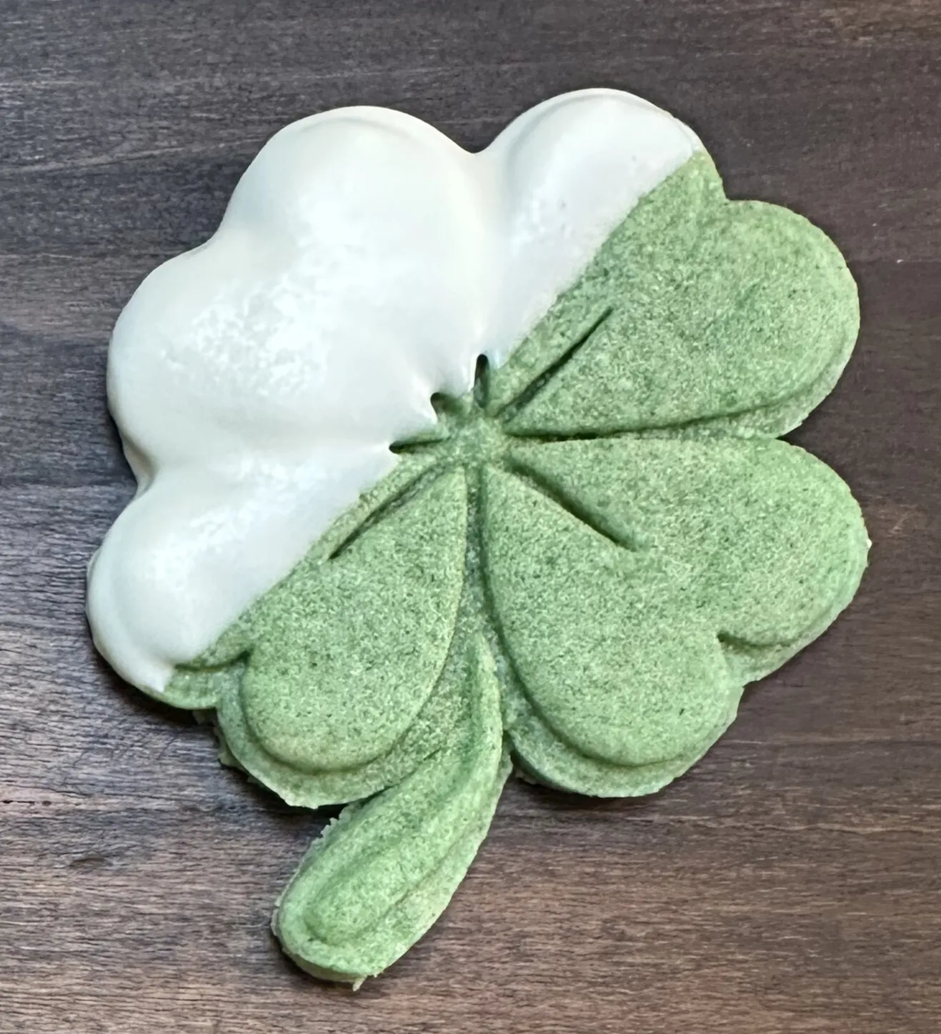 White chocolate dipped shamrock cookie